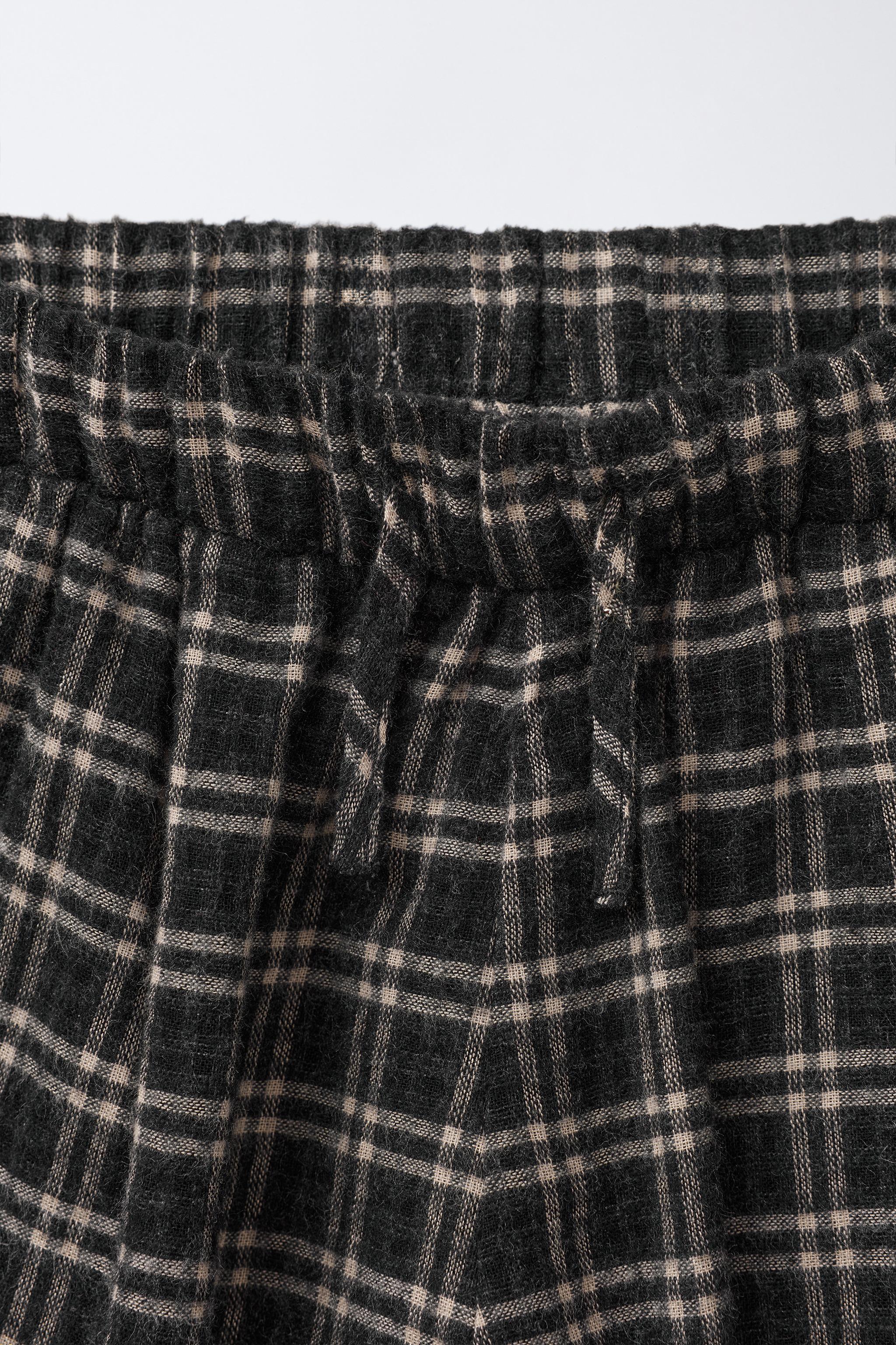 PANTALON BAGGY À CARREAUX